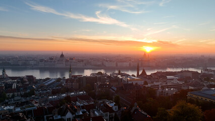 Aerial view of Hungarian Parliament Building at sunrise with the Danube river, in Budapest, Hungary