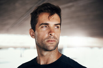 Man, face and serious thinking for workout, exercise or training at gym or athlete, sports and healthy fitness with confidence. Male, runner and sweat and focus for cardio, wellness or routine