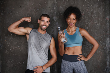 Fitness, muscle flex and portrait of couple in city after workout, body builder training and exercise. Sports, water bottle and man and woman sweating after running for endurance, wellness and energy - obrazy, fototapety, plakaty