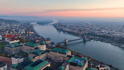 Aerial skyline view of Budapest with Buda Castle Royal Palace and River Danube at sunrise, Hungary