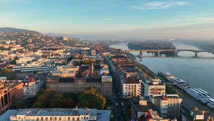 Budapest city sunrise skyline, aerial view. Danube river, Buda side, Hungary