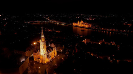 Fototapeta na wymiar Aerial view of Budapest Hungarian Parliament Building, Matthias church, Fishermans Bastion and River Danube at night, Hungary