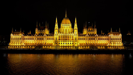 Fototapeta premium Aerial view of Budapest Hungarian Parliament Building at night. Travel, tourism and European Political Landmark Destination, Hungary