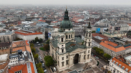 Fototapeta premium Aerial view shot of St. Stephens Basilica, cloudy day, moody Budapest, Hungary