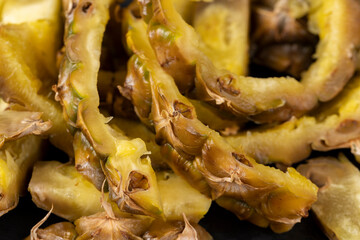 green-yellow peel of ripe pineapple close-up