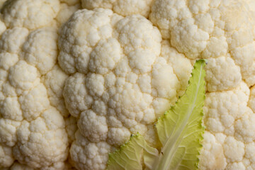 details of white cauliflower on the kitchen table