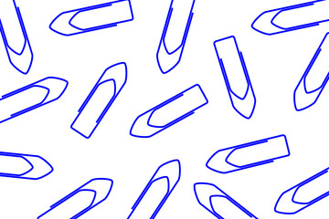 Business office pattern. A pile of blue paper clips scattered on a white background