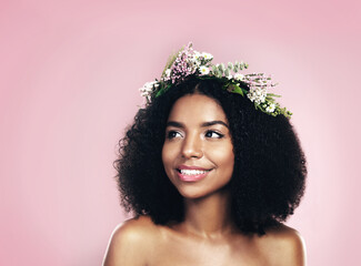 Woman, thinking and flower crown for beauty in studio, pink background and mockup of natural hair...