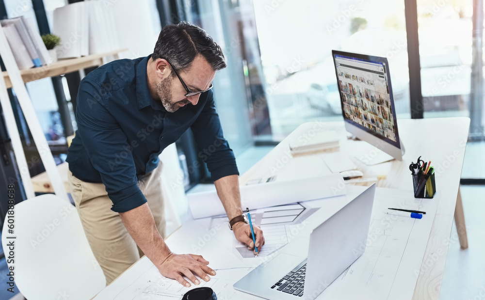 Aufkleber Corporate, man architect with laptop or computer and sketch in office with notebook at his desk at work. Technology, entrepreneur and male person drawing in plan with pc on table in modern workspace