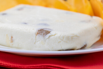 soft curd cheese with raisins and persimmons