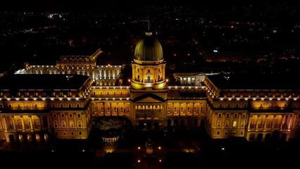 Fototapeta na wymiar Aerial night view of Buda Castle Royal Palace in Budapest city, Hungary