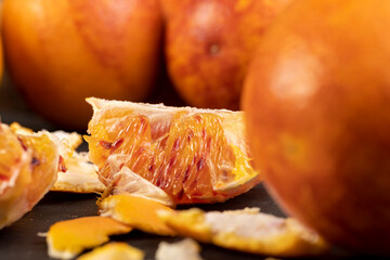 sliced orange with yellow-red juicy flesh