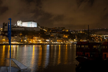Porto at night, Portugal. View from Douro river.