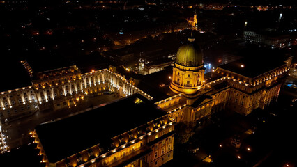 Fototapeta na wymiar Aerial night view of Buda Castle Royal Palace in Budapest city, Hungary
