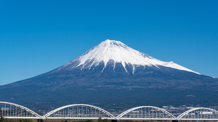 Mt. Fuji viewed from Fuji river in Fuji-shi, Shizuoka, Japan.