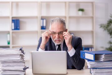 Old male employee and too much work at workplace