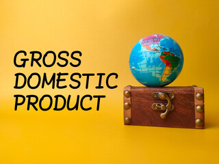 Earth globe and vintage box with the word GROSS DOMESTIC PRODUCT