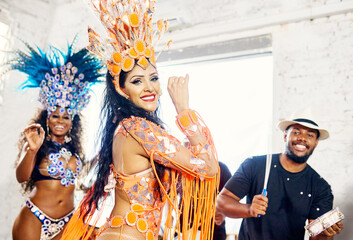 Samba, music and dance with women at carnival for celebration, party and festival in Rio de Janeiro. New year break, show and creative with brazil girl for performance, holiday and new year event