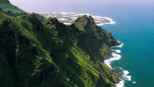 Green mountain range on ocean coastline near Punta del Hidalgo town. Anaga rural park in Tenerife, Canary Islands.