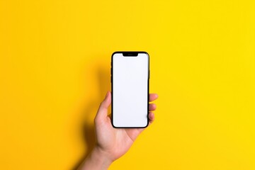 phone in hand isolated on white, hand holding a smart phone with blank screen isolated on a yellow colored background