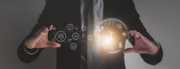 engineer holding smart virtual icon,control power generation alternative wind turbine,clean energy concept smart cities sustainability environmental protection Order artificial intelligence technology