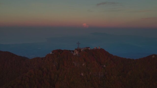 Sunrise vivid colorful aerial of a Sanctuary on the summit of a mountain Italy Sanctuary of Our Lady 'del Monte Sacro'
