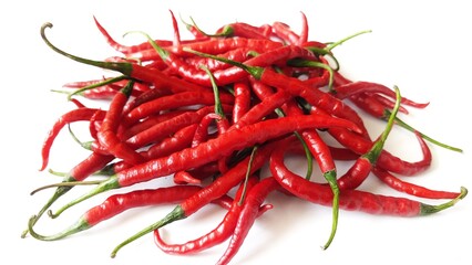 Cabai merah keriting or red hot chili peppers spicy blurred defocus isolated on white background