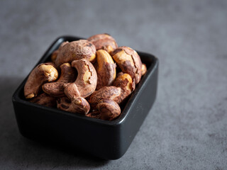 roasted cashew nuts on a plate	