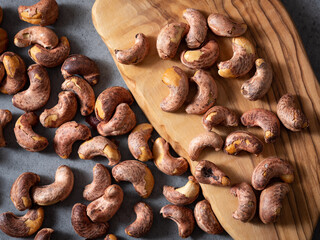 Roasted cashew nuts on a cutting board