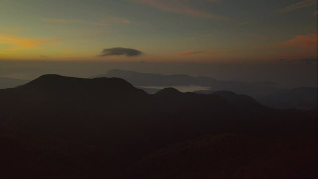 Sunrise vivid colorful aerial of dreamy mountains in the Cilento National Park Italy 4K drone