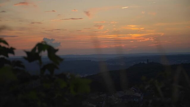 High-angle sunset view of Forbach city with the Schlossberg Castle in the background