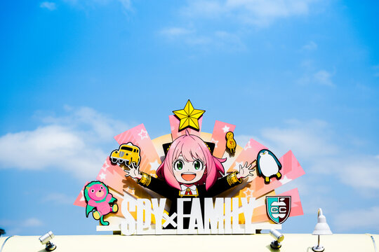 Japan - April 03, 2023: Anya little cute girl in Spy x Family cartoon logo sign entry in amusement park tourism spot of Universal Studios Japan, Osaka