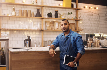 Waiter, tablet and portrait of man in cafe for online, entrepreneurship and startup. African, technology and food industry with small business owner in restaurant for barista, manager and coffee shop