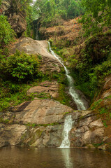 Obraz premium Tirikhola Dancing Falls, Namchi, Sikkim, India. It is a beautiful waterfall from Himalayan mountains and a very popular tourist spot.