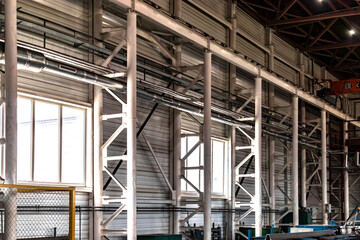 Interior of a modern factory. A bright large workshop. Plant for the production of metal structures.