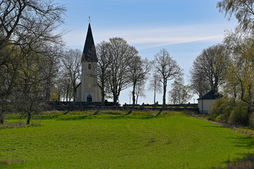 Fototapeta na wymiar Norrbyas church and blue sky near Orebro Sweden may 9 2023