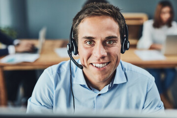 Businessman, call center and portrait smile for customer service, support or telemarketing at the office. Man employee, consultant or agent smiling for online advice, help or assistance in contact us