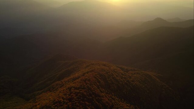Sunrise vivid colorful aerial of dreamy mountains in the Cilento National Park Italy 4K drone