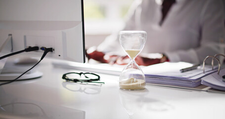Late Invoice And Billing Deadline With Hourglass