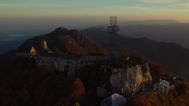 Sunrise vivid colorful aerial of a Sanctuary on the summit of a mountain Italy Sanctuary of Our Lady 'del Monte Sacro'