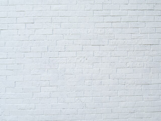 Brick wall and white surface, clean, rough, uneven surface material. Retro decoration construction.
