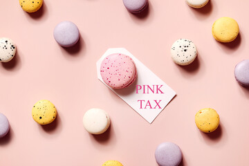 pink tax concept. big pink dessert and small desserts on beige background. comparison style