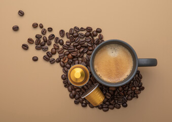 Coffee cup with fresh raw beans and coffee capsules on beige background.