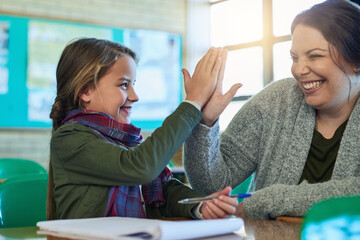 High five, student and teacher happy to help with work, study and learning math in classroom and...