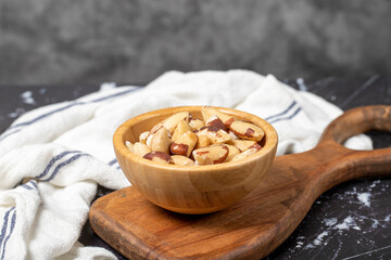 Brazil nut. Brazil nut in wooden bowl. Superfood. Vegetarian food concept. healthy snacks