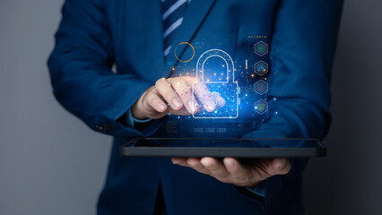 Businessman with encrypted hologram to enter business management system, encryption secure sensitive data, set password, protection of sensitive data. Encryption concept access data.