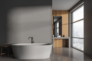 Fototapeta na wymiar Grey bathroom interior with bathtub and sink near panoramic window. Empty wall
