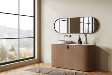 Beige bathroom interior with sink and dresser, decoration and panoramic window - obrazy, fototapety, plakaty