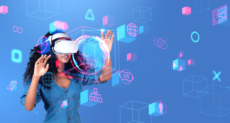 Young African woman in VR glasses exploring metaverse
