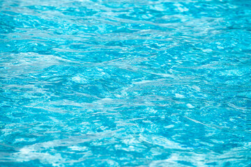 Pool water background, blue wave abstract or rippled water texture background.